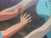 The shot of Shinji reaching for her breasts is, of course, a suggestion of where Fuyutsuki allows his mind to wander for a second.